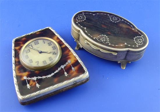 A George V silver and tortoiseshell timepiece & a casket